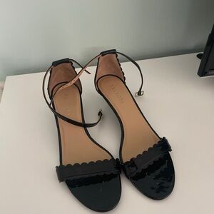 Women’s black Talbots scalloped heels